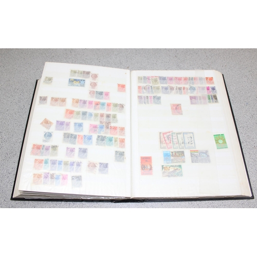 555 - Stamps - World in 64 page stockbook, (1000s)