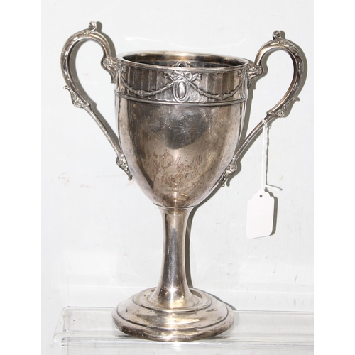 1063 - A large early 20th century silver plated trophy cup with classical style border, approx 33cm tall, a... 