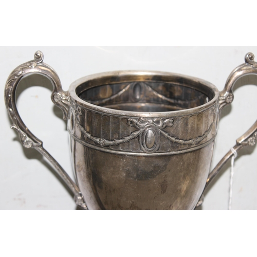 1063 - A large early 20th century silver plated trophy cup with classical style border, approx 33cm tall, a... 