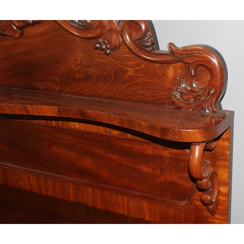 117 - A 19th century mahogany sideboard with shelf over a hidden drawer and a cupboard, approx 120cm wide ... 