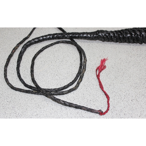 1421 - Vintage black leather bullwhip, approx 2.4m long