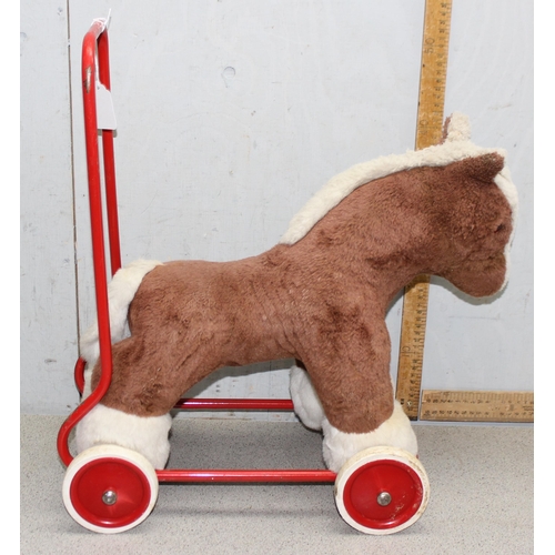 1544 - A vintage push along toy horse by Deans of Wales