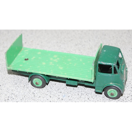 1548 - A vintage Dinky Toys 513 Guy Flat Truck with Tailboard, 2 tone green, in original box