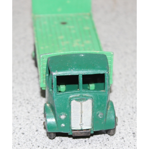 1548 - A vintage Dinky Toys 513 Guy Flat Truck with Tailboard, 2 tone green, in original box