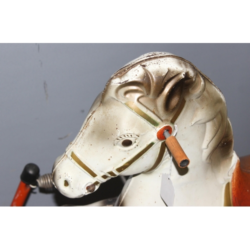 1551 - A vintage painted metal Mobo rocking horse on metal frame stand