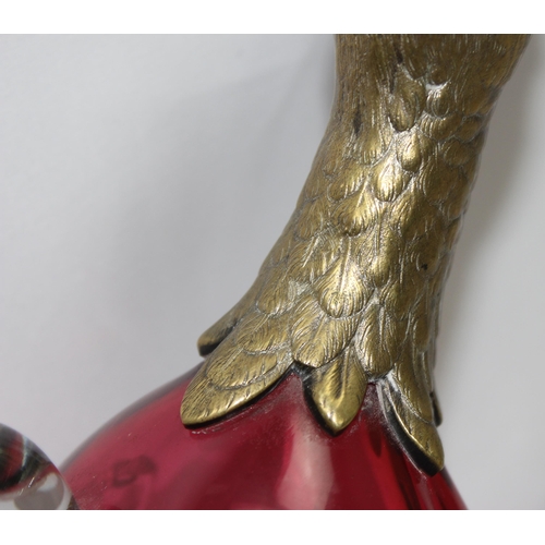 1655 - A rare cranberry glass and silver plate mounted decanter or claret jug formed as a duck, the feet ma... 