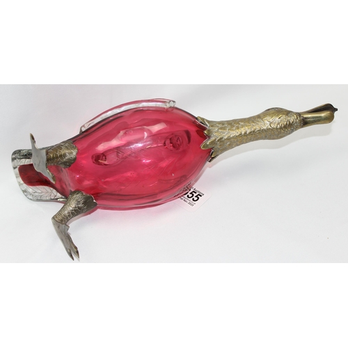 1655 - A rare cranberry glass and silver plate mounted decanter or claret jug formed as a duck, the feet ma... 