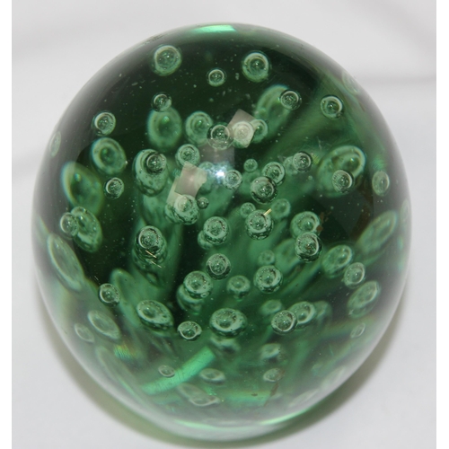 1658 - A classic style 19th century Victorian green glass dump paperweight with bubble design, approx 10cm ... 