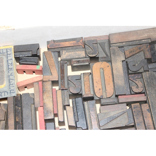 1661 - A large qty of vintage wooden printers blocks