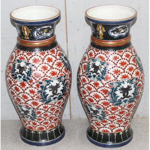 1665 - A large decorative pair of Chinese porcelain vases decorated in polychrome enamel, both bearing seal... 