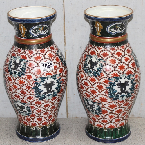 1665 - A large decorative pair of Chinese porcelain vases decorated in polychrome enamel, both bearing seal... 