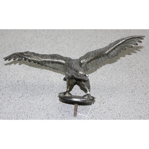 744 - A large vintage chrome plated car mascot formed as an eagle, wingspan approx 26cm