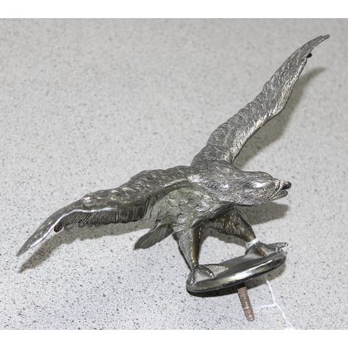 744 - A large vintage chrome plated car mascot formed as an eagle, wingspan approx 26cm