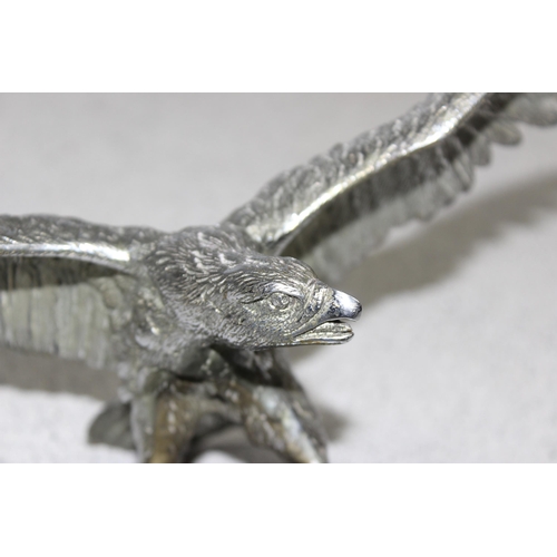 744 - A large vintage chrome plated car mascot formed as an eagle, wingspan approx 26cm