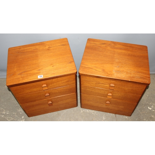 104 - A pair of retro Stag 3 drawer bedside cabinets, each approx 56cm wide x 44cm deep x 64cm tall