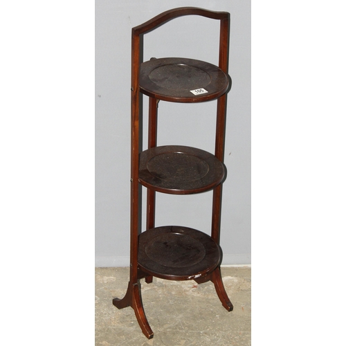 105 - A vintage folding mahogany 3 tier cake stand, approx 84cm tall