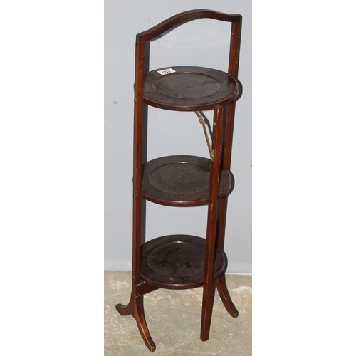 105 - A vintage folding mahogany 3 tier cake stand, approx 84cm tall