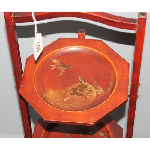 106 - An early 20th century Japanese red lacquer folding 3 tier cake stand, approx 83cm tall