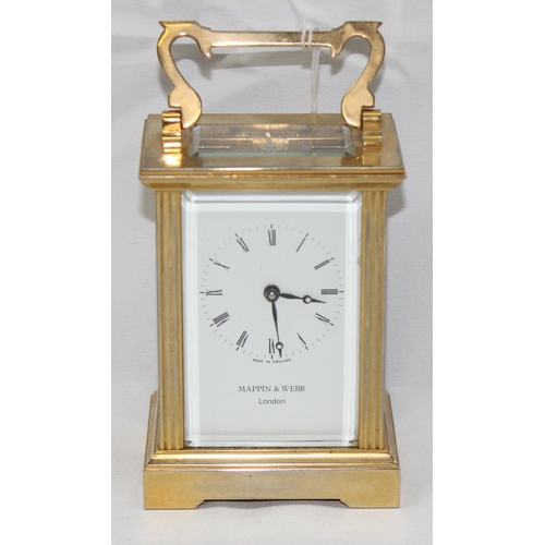 1333 - Mappin & Webb, a 20th century brass and glass cased carriage clock with English made mechanical move... 