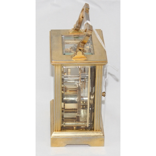 1333 - Mappin & Webb, a 20th century brass and glass cased carriage clock with English made mechanical move... 