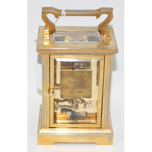 1333 - Mappin & Webb, a 20th century brass and glass cased carriage clock with English made mechanical move... 