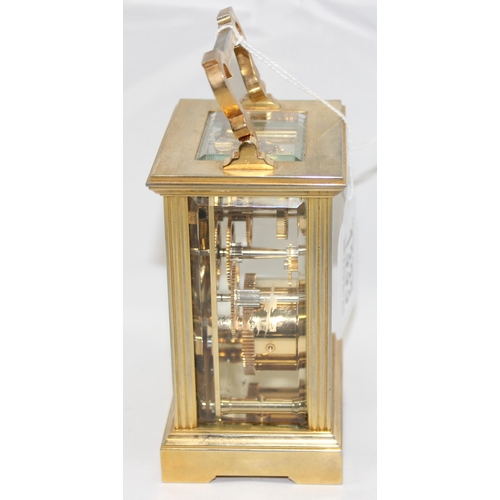 1333 - Mappin & Webb, a 20th century brass and glass cased carriage clock with English made mechanical move... 