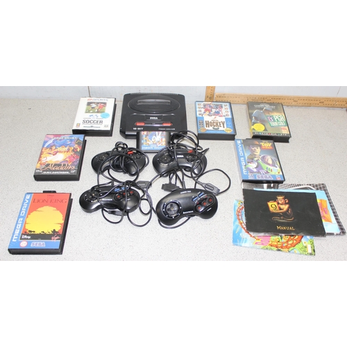 1541 - Sega Megadrive console, 4 controllers, 7 games and various manuals