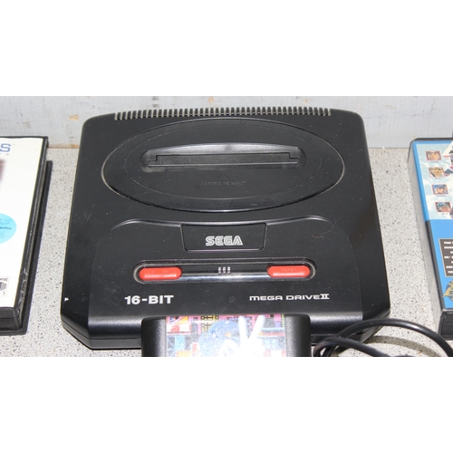 1541 - Sega Megadrive console, 4 controllers, 7 games and various manuals