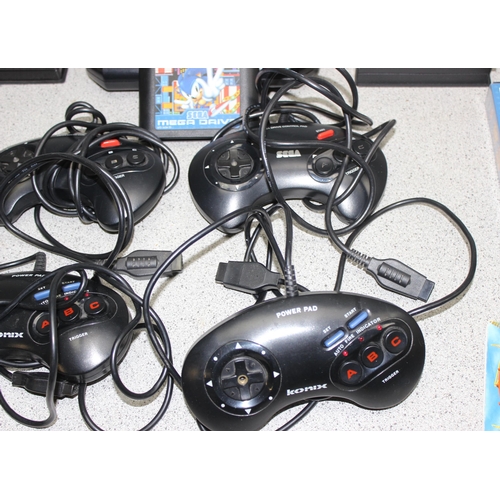 1541 - Sega Megadrive console, 4 controllers, 7 games and various manuals