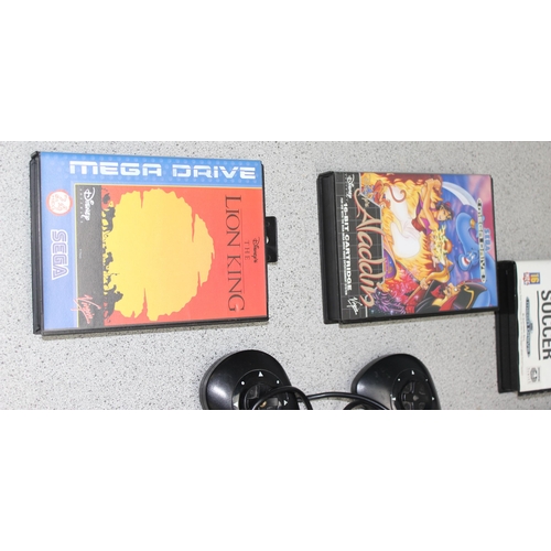 1541 - Sega Megadrive console, 4 controllers, 7 games and various manuals