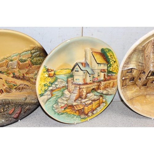 1773 - 4 vintage 3-D wall art plaster plaques, mostly of fishing/marine scenes, largest approx 38cm