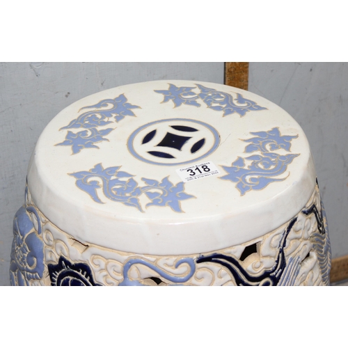 318 - Blue and white ceramic garden seat, decorated with Chinese dragons, approx 45cm tall