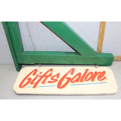 450 - Painted wooden 'Gifts Galore' wall mounted sign approx 66cm W x 86cm H