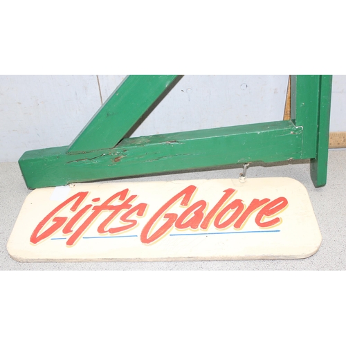 450 - Painted wooden 'Gifts Galore' wall mounted sign approx 66cm W x 86cm H