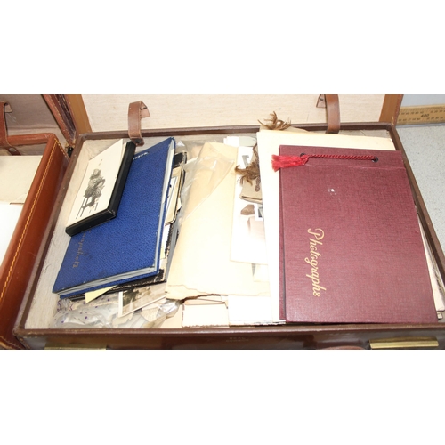 564 - 2 vintage suitcases full of ephemera and photos, seemingly belonging to the same family