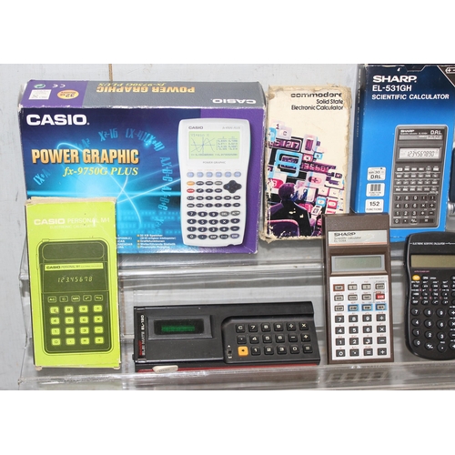 664 - Qty of vintage and later calculators and organisers to incl Casio and Commodore