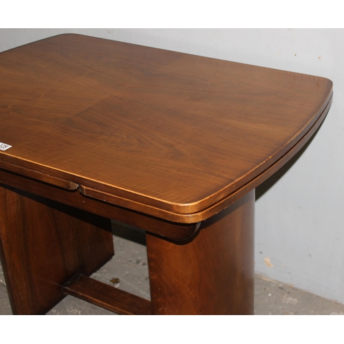 125 - An Art Deco period extending dining table, approx 106cm wide x 76cm deep x 78cm tall, approx 166cm w... 