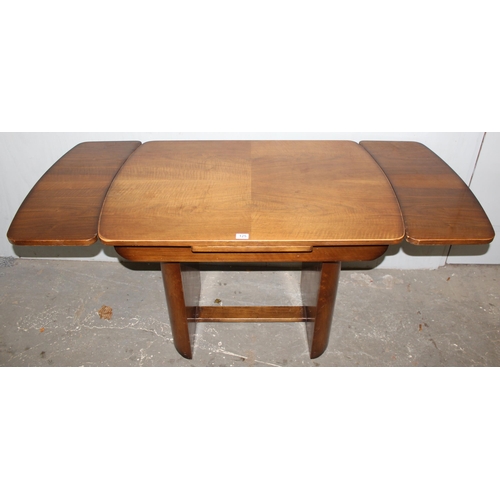 125 - An Art Deco period extending dining table, approx 106cm wide x 76cm deep x 78cm tall, approx 166cm w... 