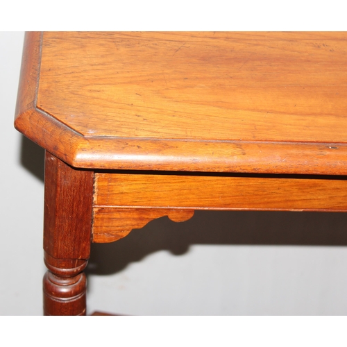 135 - An Edwardian mahogany hall table with turned legs and undertier, approx 85cm wide x 46cm deep x 76cm... 