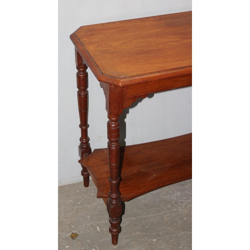 135 - An Edwardian mahogany hall table with turned legs and undertier, approx 85cm wide x 46cm deep x 76cm... 