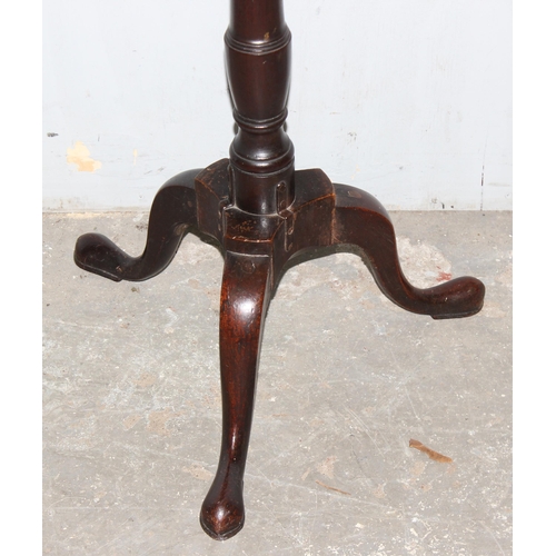 141 - A small antique mahogany tilt topped wine table, approx 45cm wide x 45cm deep x 70cm tall