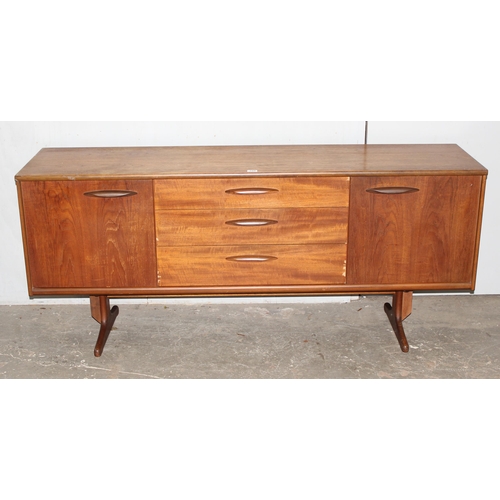 4 - A retro mid-century sideboard, possibly by Jentique but seemingly unmarked, 3 drawers flanked by 2 c... 