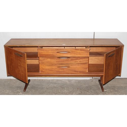 4 - A retro mid-century sideboard, possibly by Jentique but seemingly unmarked, 3 drawers flanked by 2 c... 