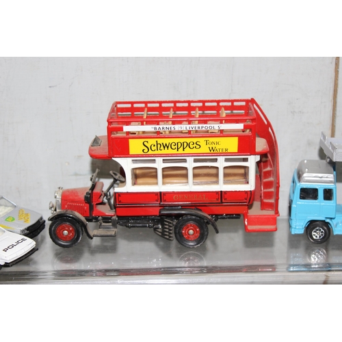 1553 - Qty of Corgi diecast toy vehicles to include a car transporter & a vintage open topped bus