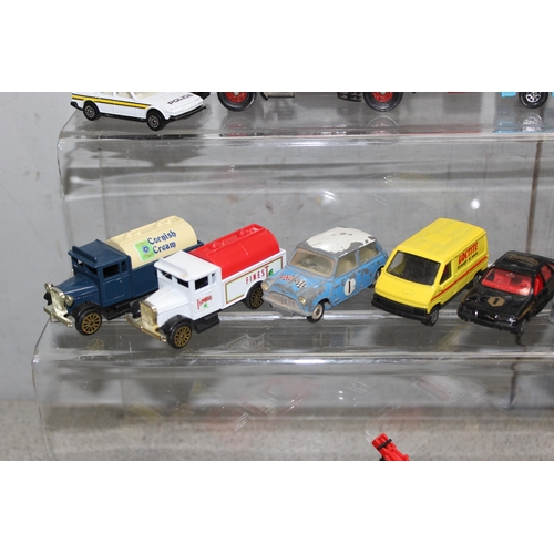 1553 - Qty of Corgi diecast toy vehicles to include a car transporter & a vintage open topped bus