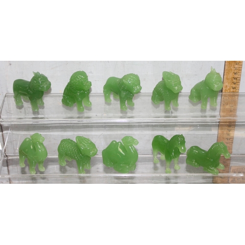 1804 - 10 assorted vintage green jade coloured glass figures