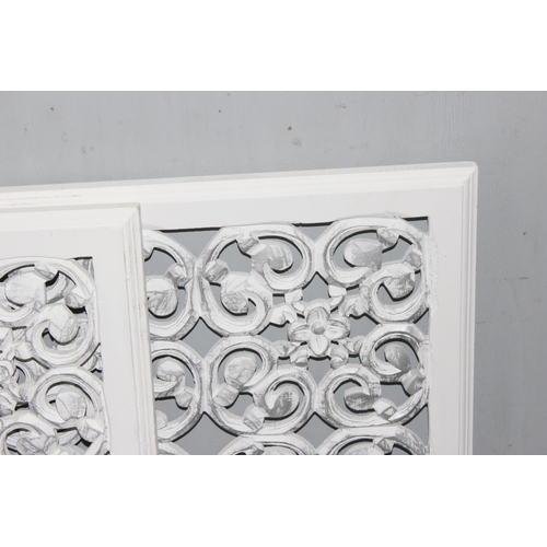 482 - 3 decorative white painted wooden panels with pierced design, each approx 91cm square