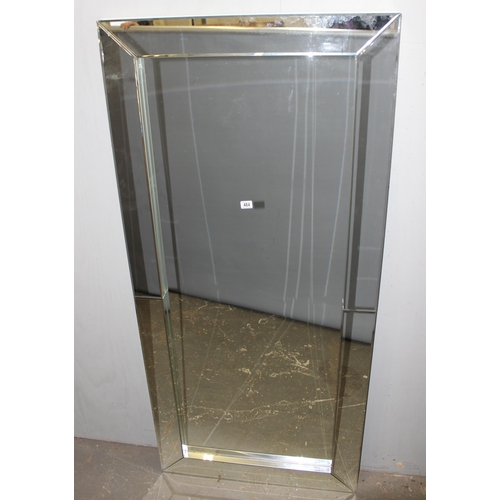 484 - A large wall mirror with mirrored frame, approx 200cm x 90cm