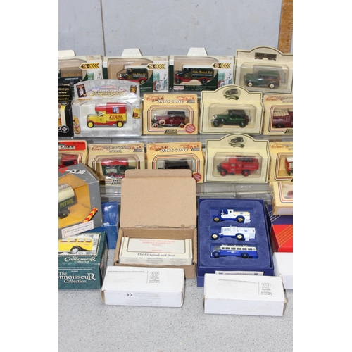 1557 - A large qty of assorted boxed model vehicles to inc Corgi & Days Gone etc