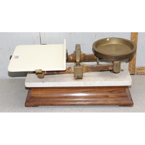 1805 - A set of early 20th century brass and marble butcher's shop scales